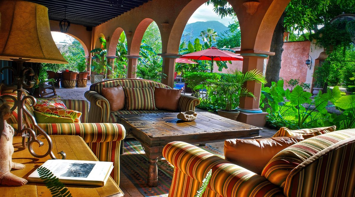 The hacienda terrace with arched colonnades